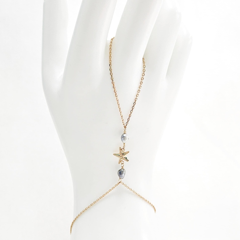 Bijou de main en plaqué or Étoile et keishis