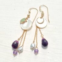 Boucles d'oreilles violet pompon